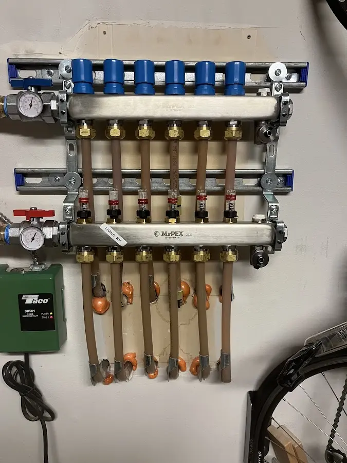 Plumber performing Water Heater Repair at a residential property in Mundy